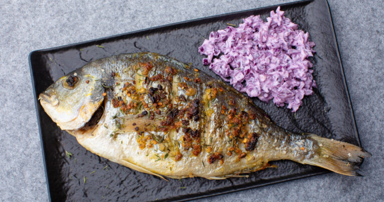 Grilled whole dorada with red cabbage salad