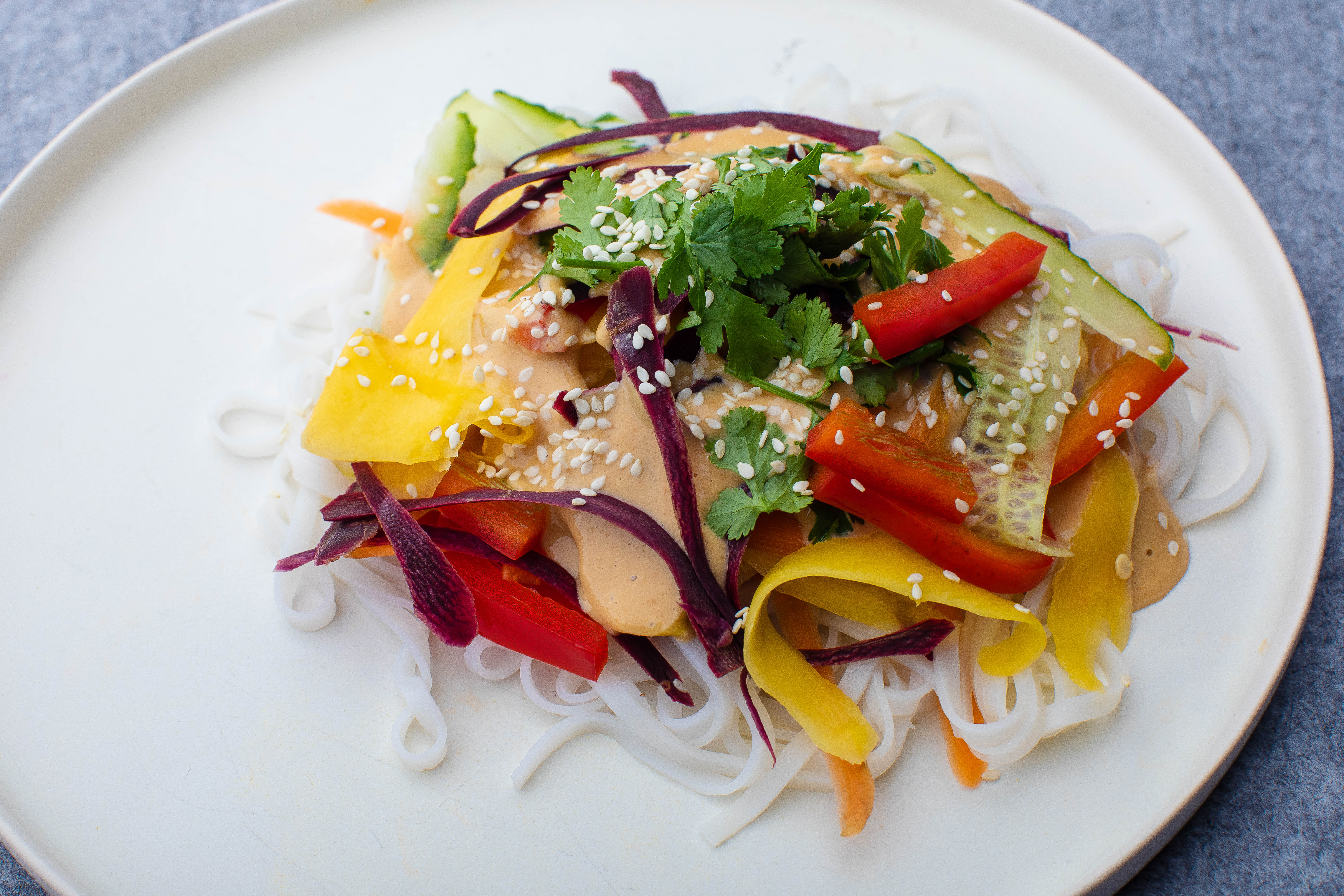 Colourful Thai noodle salad with peanut butter dressing
